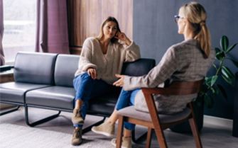 Two people having a heartfelt conversation.