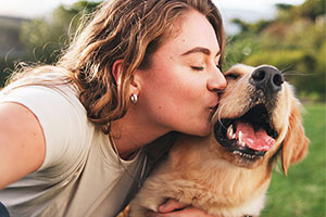 A woman with her dog.