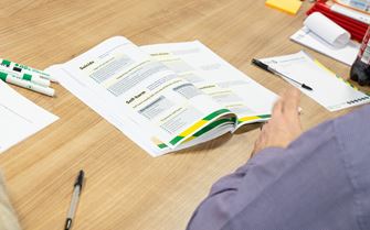 A mental health first aid student studying.