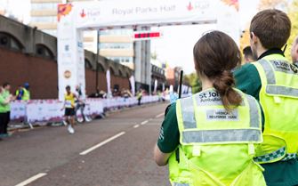 SJA medical response team watch runners cross the finish line at Royal Parks Half Marathon
