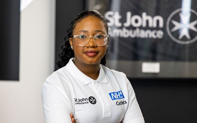 Young teenager wearing an NHS Cadet polo shirt.