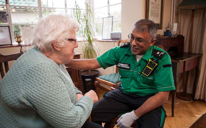 Community First Responder reassuring a patient