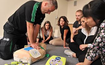 A class engaged in an Emergency First Aid at Work course. A class engaged in an Emergency First Aid at Work course.
